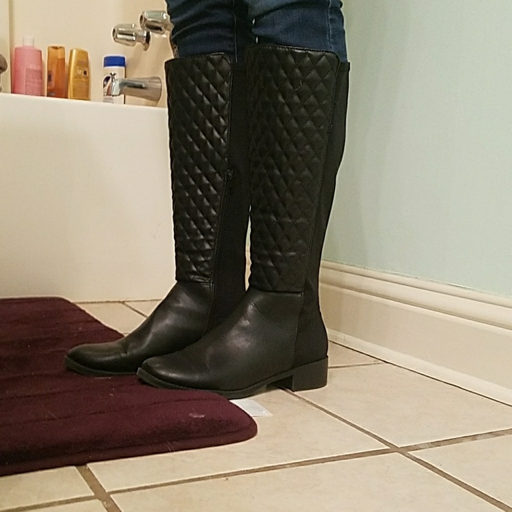 Black quilted boots.